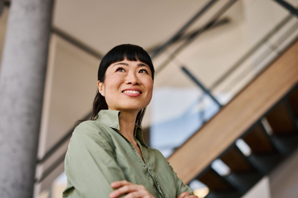 Resilient employee looking hopeful.