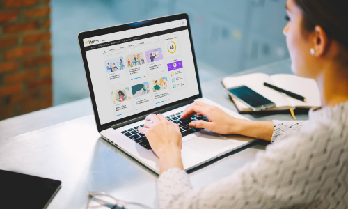 woman's hands typing on laptop computer